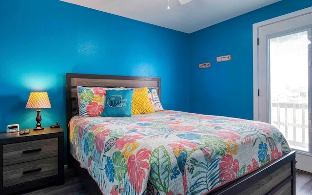 bedroom featuring dark wood-type flooring and ceiling fan