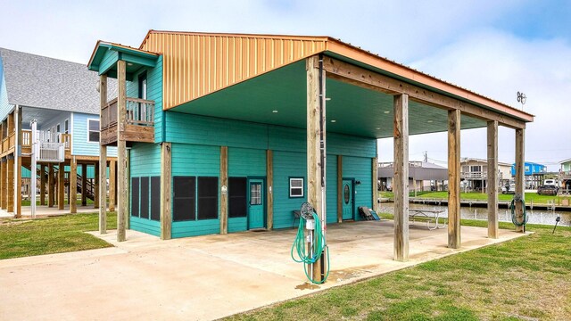 view of building exterior with a water view