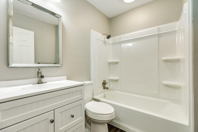 full bathroom with vanity, wood-type flooring, bathtub / shower combination, and toilet