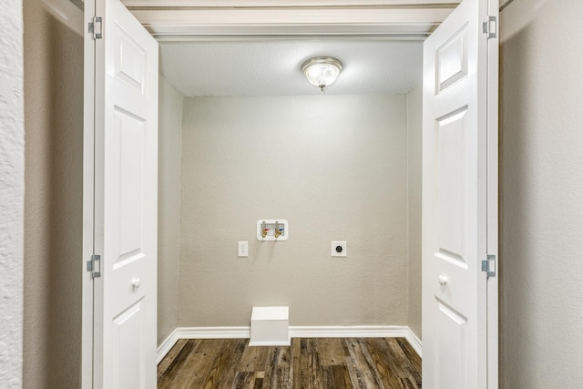 laundry area featuring dark hardwood / wood-style floors, hookup for an electric dryer, and hookup for a washing machine