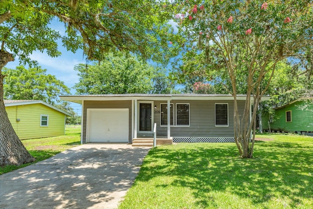 single story home with a garage and a front yard