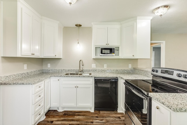 kitchen featuring stainless steel electric stove, pendant lighting, white cabinetry, black dishwasher, and sink