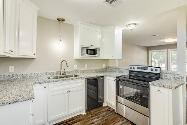 kitchen with built in microwave, black dishwasher, sink, white cabinets, and stainless steel range with electric stovetop