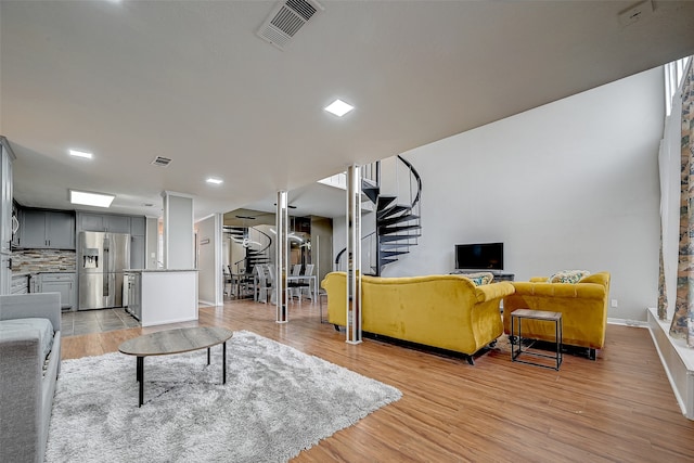 living room featuring light wood-type flooring