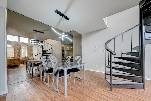 dining area featuring light wood-type flooring