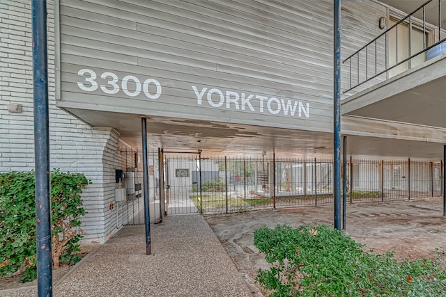 entrance to property with a balcony