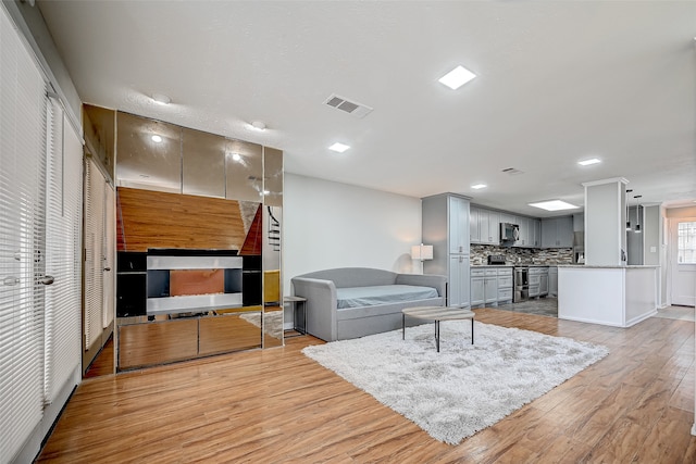 living room featuring light wood-type flooring