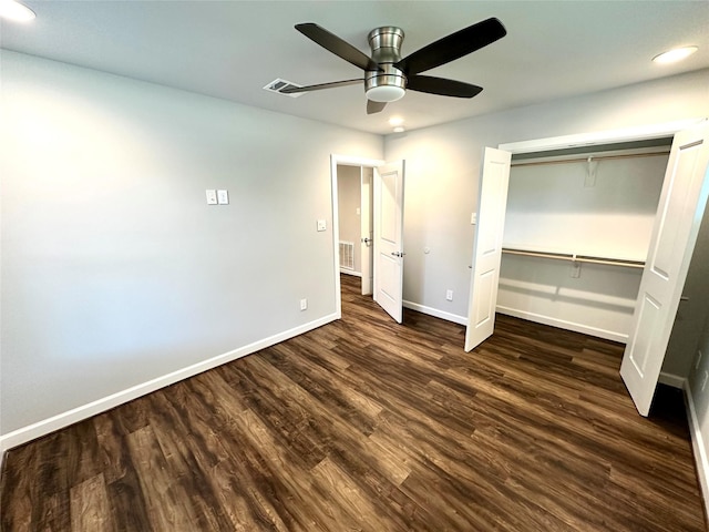 unfurnished bedroom with a closet, ceiling fan, and dark hardwood / wood-style floors