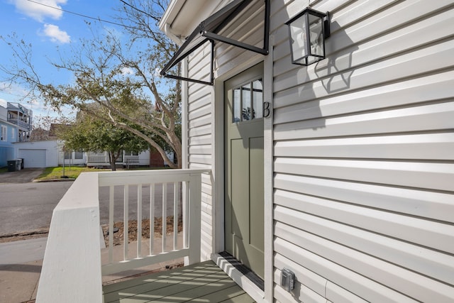 doorway to property with a garage