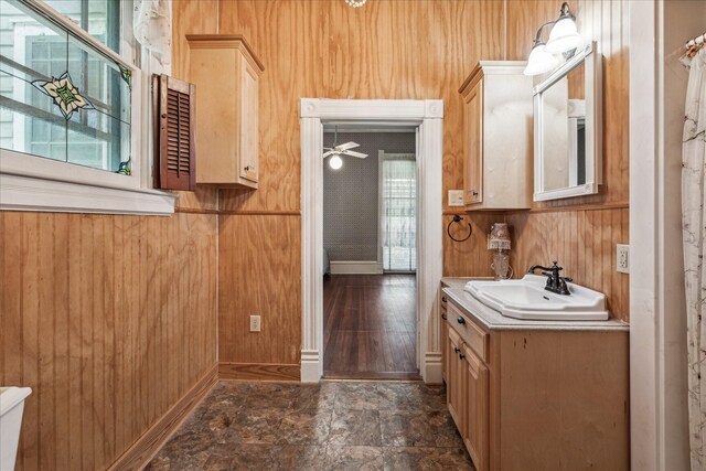 bathroom featuring tile flooring, large vanity, ceiling fan, and toilet