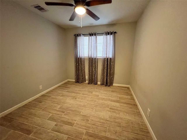 spare room with ceiling fan and light hardwood / wood-style floors