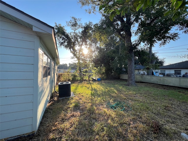 view of yard with central AC unit