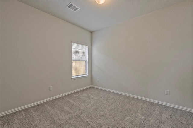 empty room featuring carpet