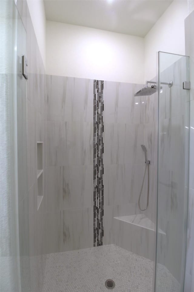 bathroom featuring walk in shower