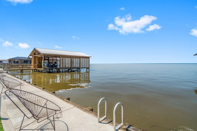 dock area with a water view