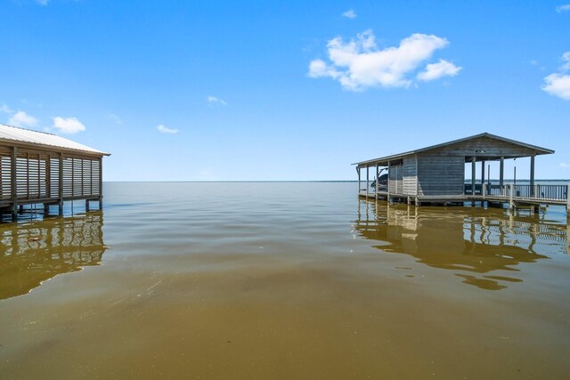 dock area with a water view