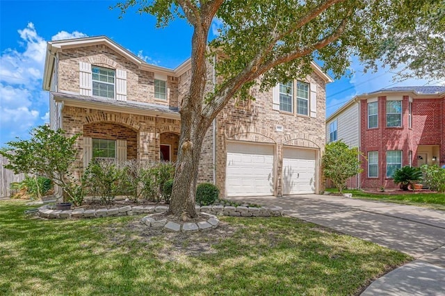 view of front of house featuring a garage and a front yard