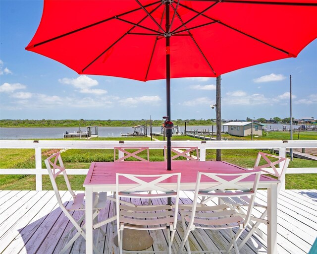 1214 County Road 201, Sargent, TX 77414 - wooden terrace featuring a water view