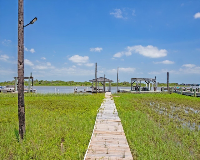 view of dock with a water view