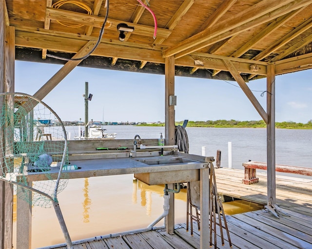 dock area featuring a water view and boat lift