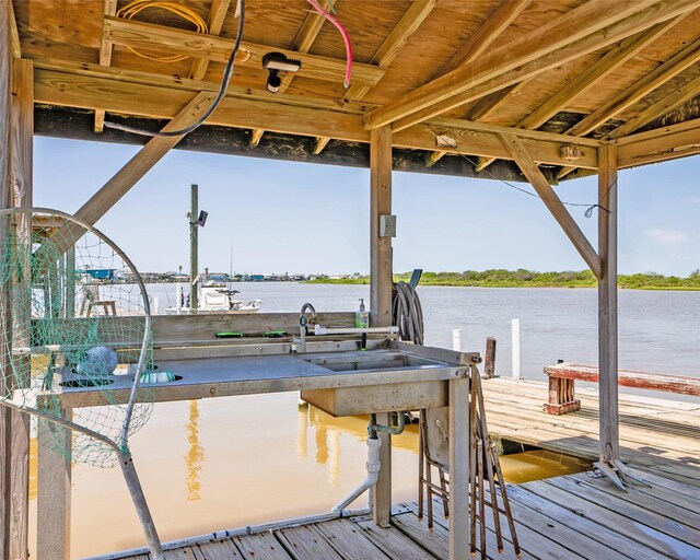 1214 County Road 201, Sargent, TX 77414 - dock area featuring a water view and boat lift