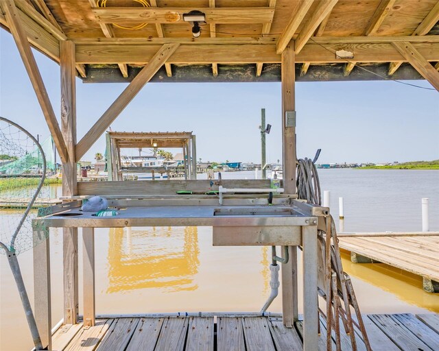 1214 County Road 201, Sargent, TX 77414 - dock featuring a water view