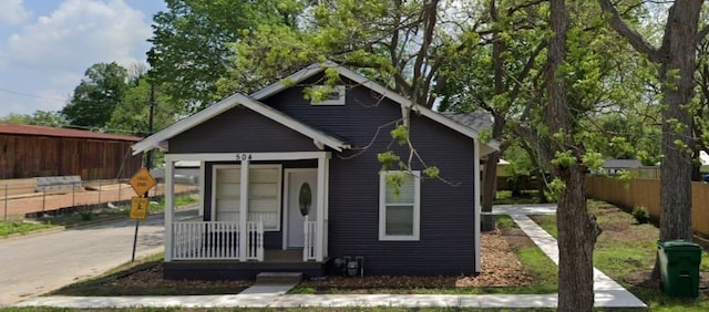 view of outbuilding with a porch