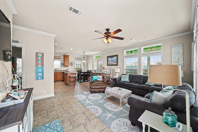 living room featuring crown molding, ceiling fan, and light tile patterned floors