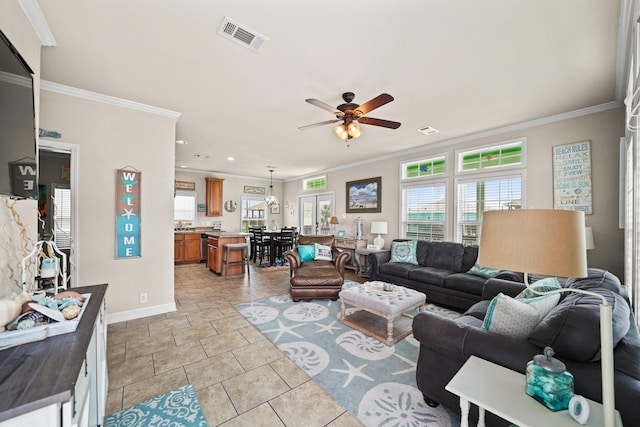 living room featuring crown molding and plenty of natural light