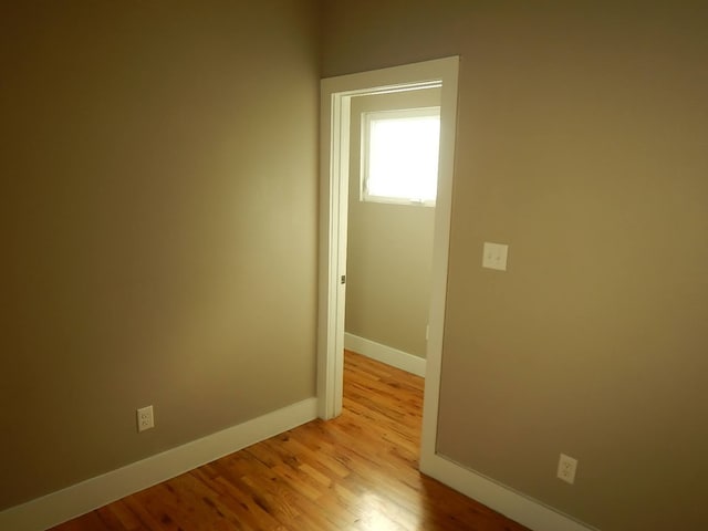 spare room with light hardwood / wood-style floors