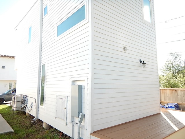 view of side of property with a deck