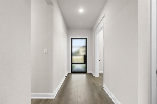 hall featuring dark wood-type flooring