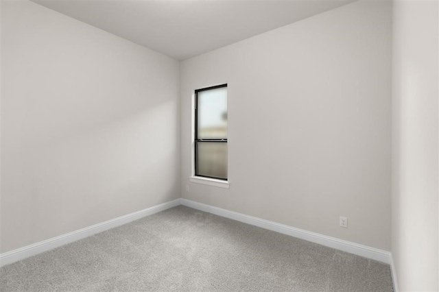 spare room with carpet flooring