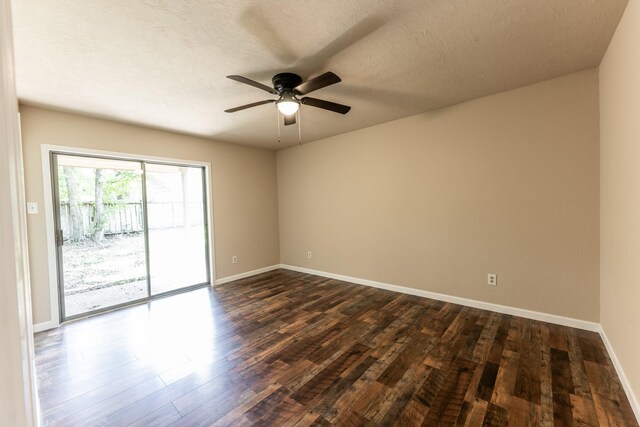 spare room with hardwood / wood-style flooring, a textured ceiling, and ceiling fan