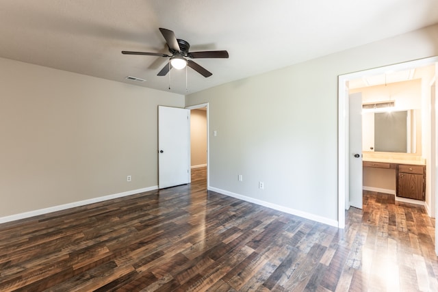 interior space featuring ceiling fan and dark hardwood / wood-style floors