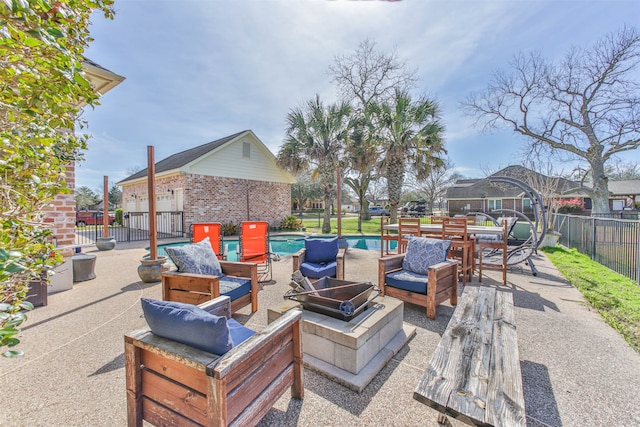 view of patio / terrace featuring an outdoor hangout area and a fenced in pool