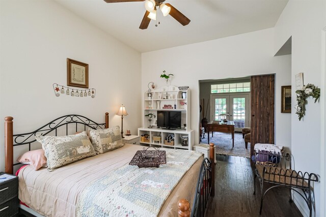 bedroom with french doors, ceiling fan, and dark hardwood / wood-style floors