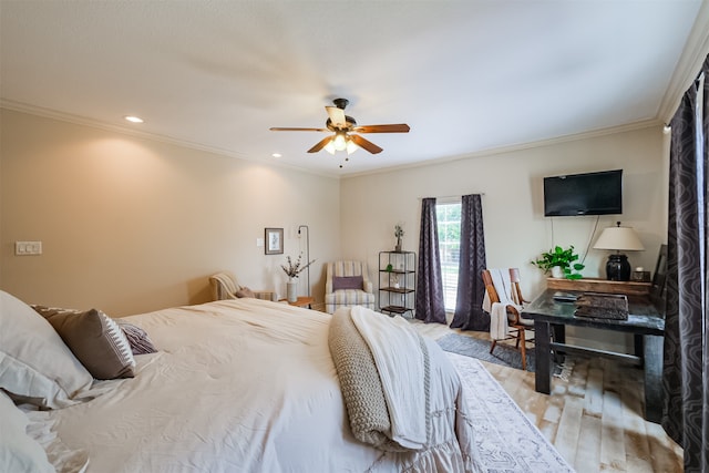 bedroom with wood-type flooring, ceiling fan, and crown molding