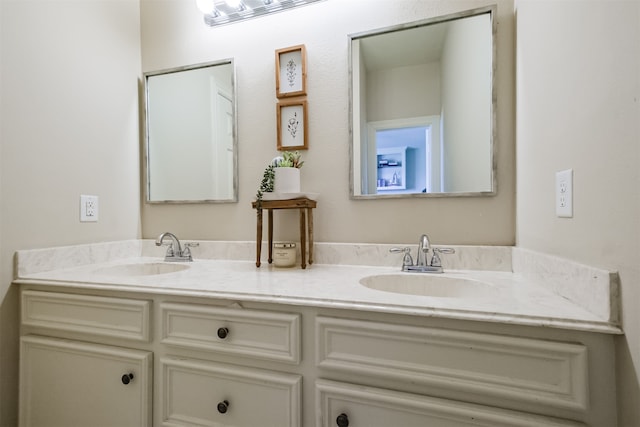 bathroom with double sink and oversized vanity