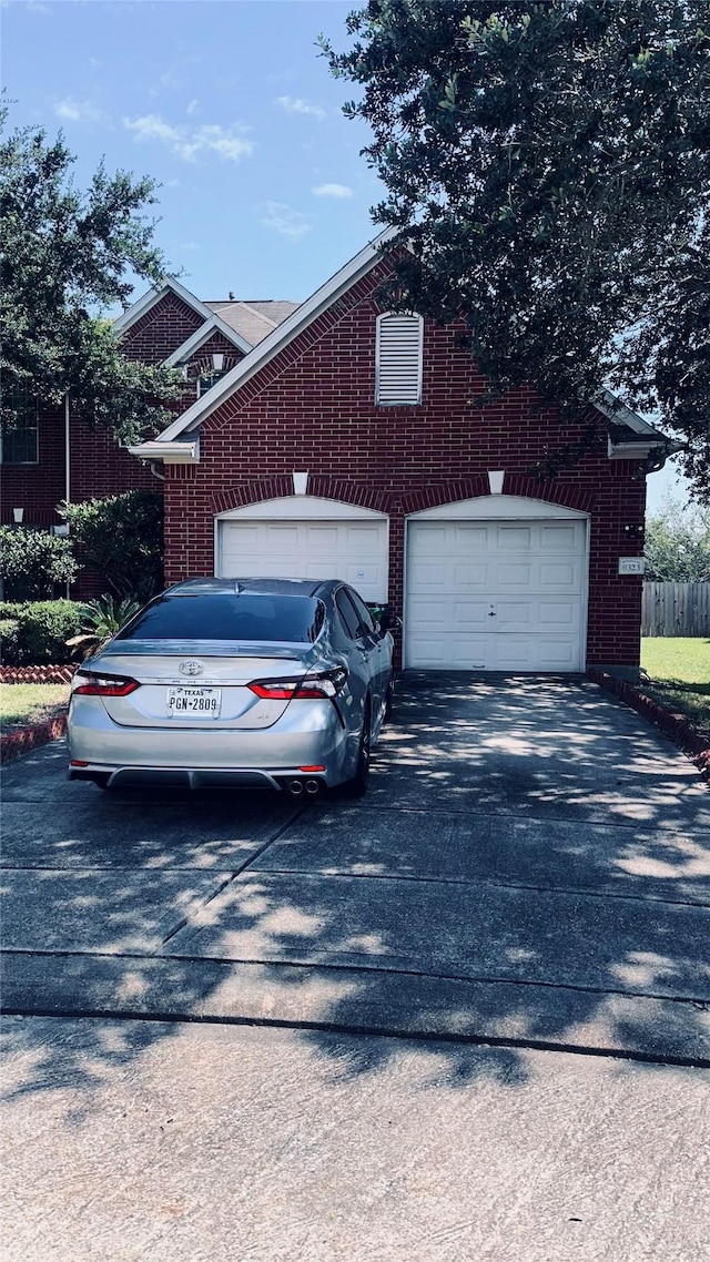 exterior space with a garage