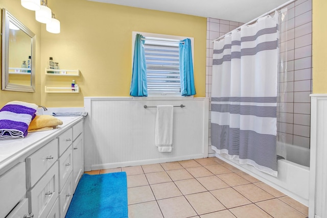 bathroom with vanity, shower / tub combo, and tile patterned flooring