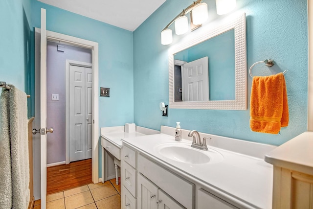 bathroom featuring vanity and tile patterned flooring