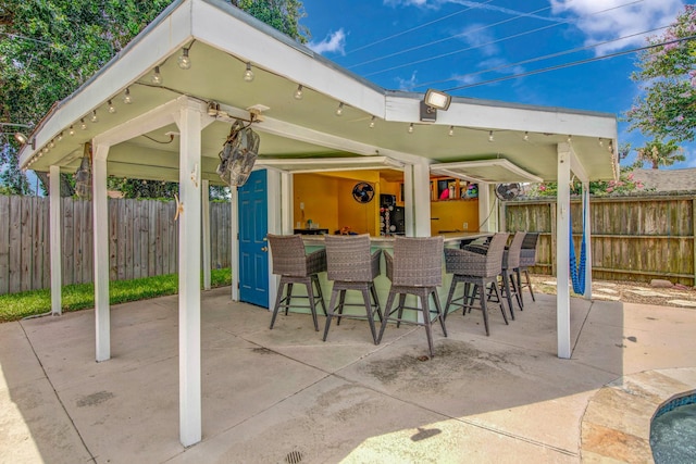 view of patio / terrace featuring exterior bar