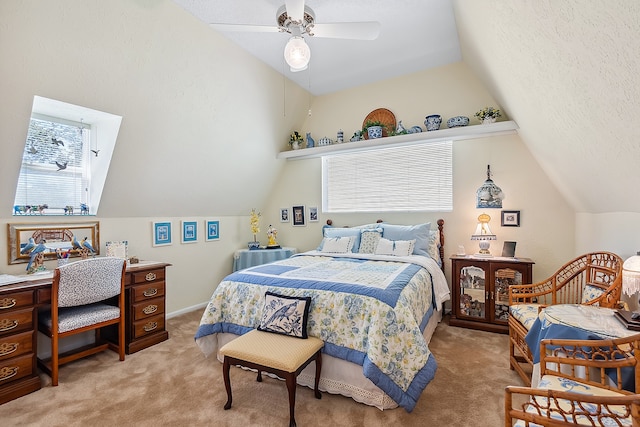 carpeted bedroom featuring lofted ceiling and ceiling fan