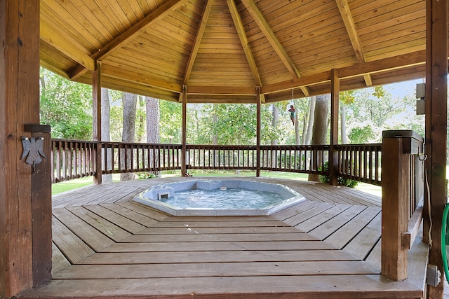 wooden deck featuring a gazebo