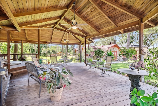 wooden terrace featuring ceiling fan