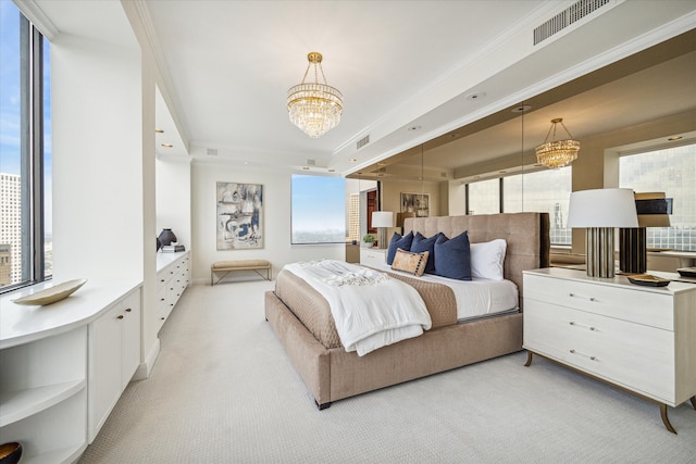 carpeted bedroom featuring a notable chandelier and ornamental molding