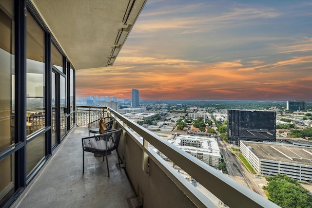 view of balcony at dusk