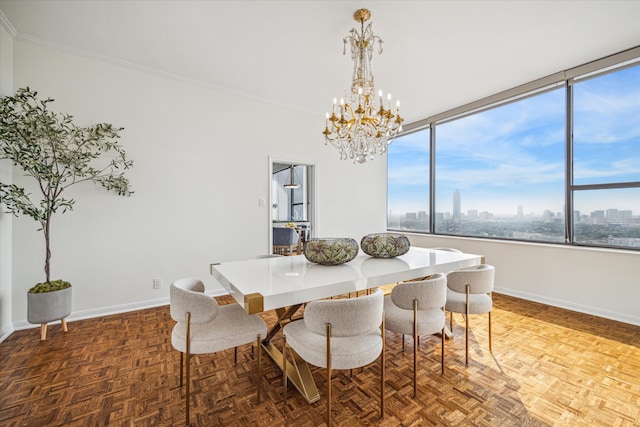 dining space featuring parquet floors, ornamental molding, and a notable chandelier