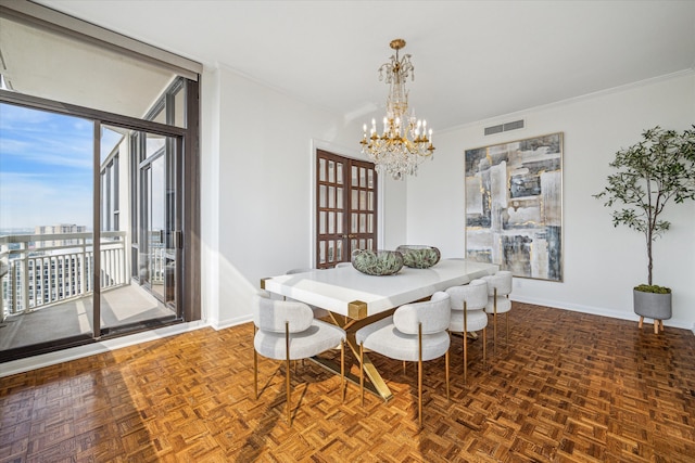 dining room featuring dark parquet flooring, a wall of windows, a chandelier, and ornamental molding